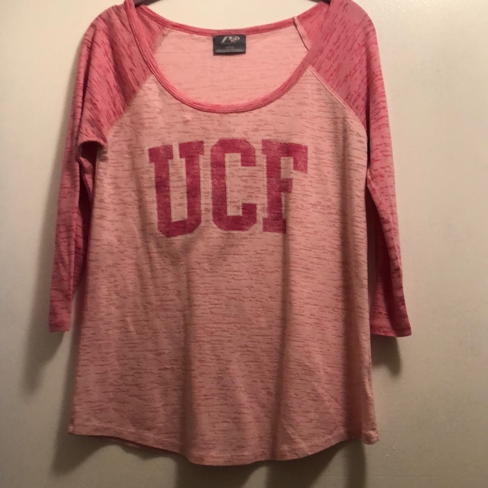 Pink long sleeved sweater with UCF as in the college written on it